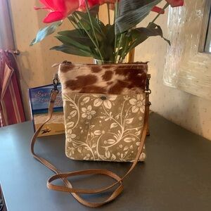 Myra Bag, crossbody zippered. Snap pocket on front, zipper pocket on back.